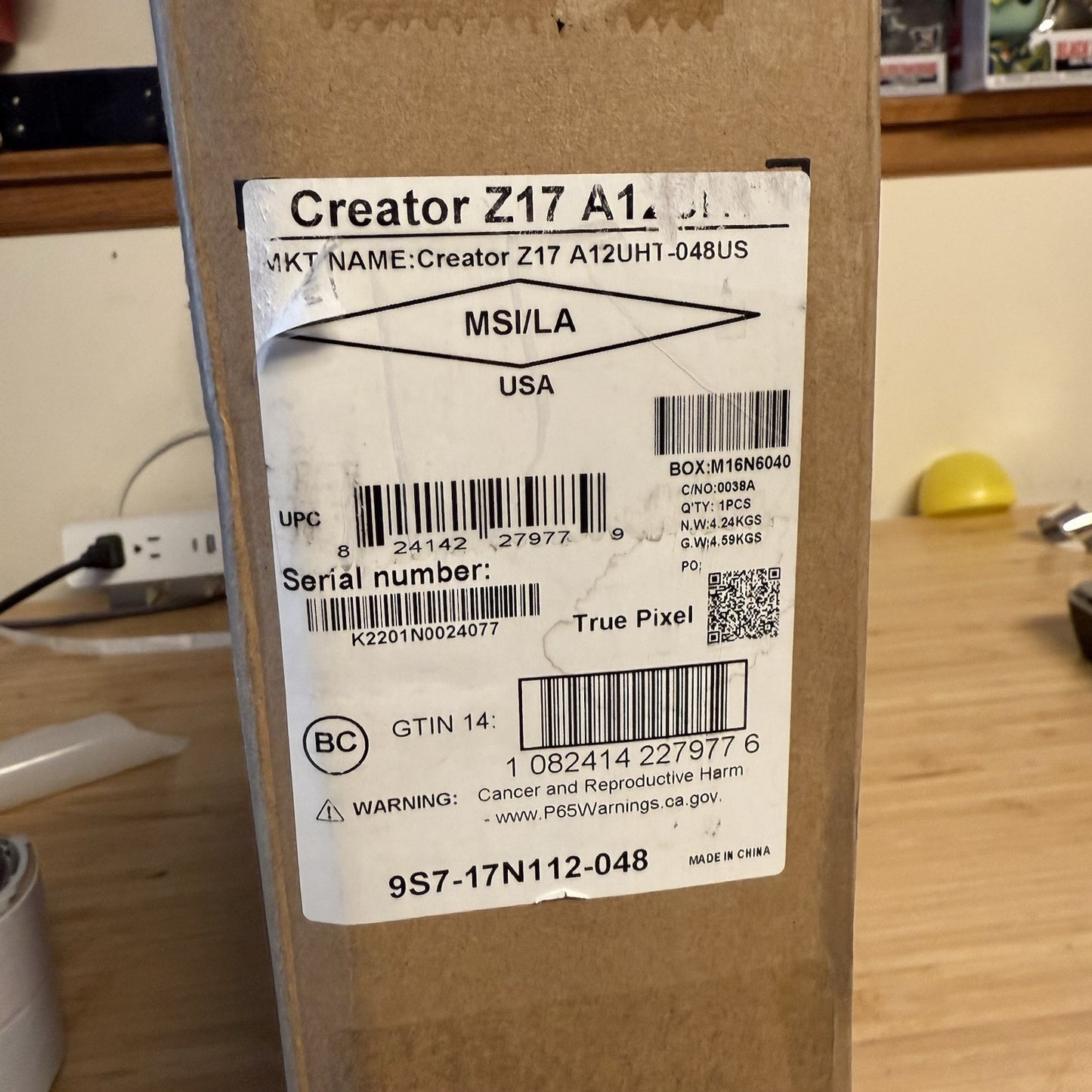 7574989